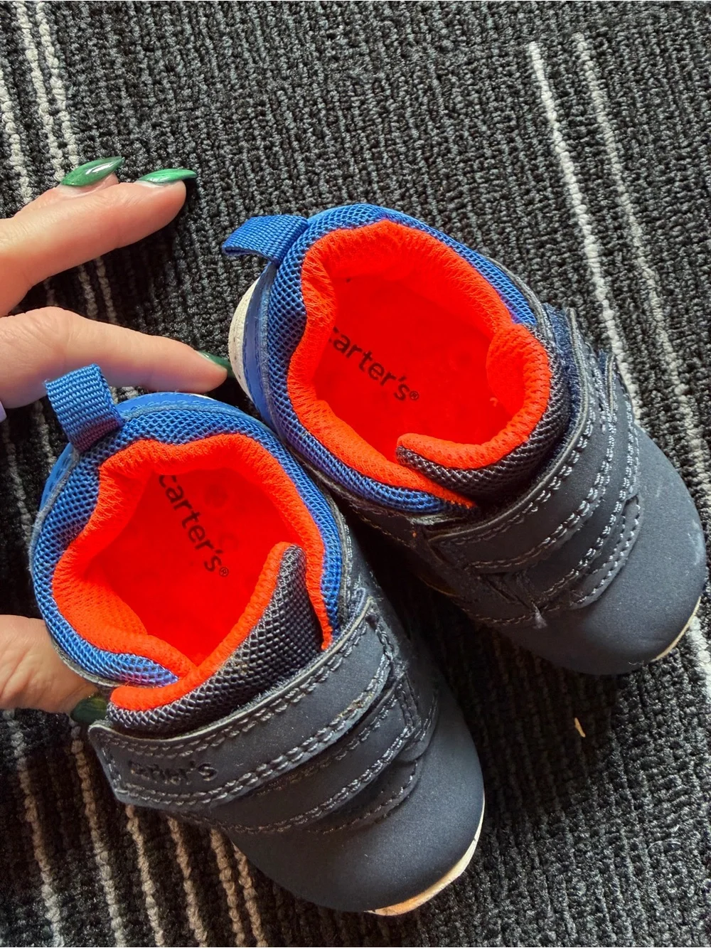 2 pairs of  baby Navy Sneakers w/Orange Lining. Plus bonus navy Velcro sneaker